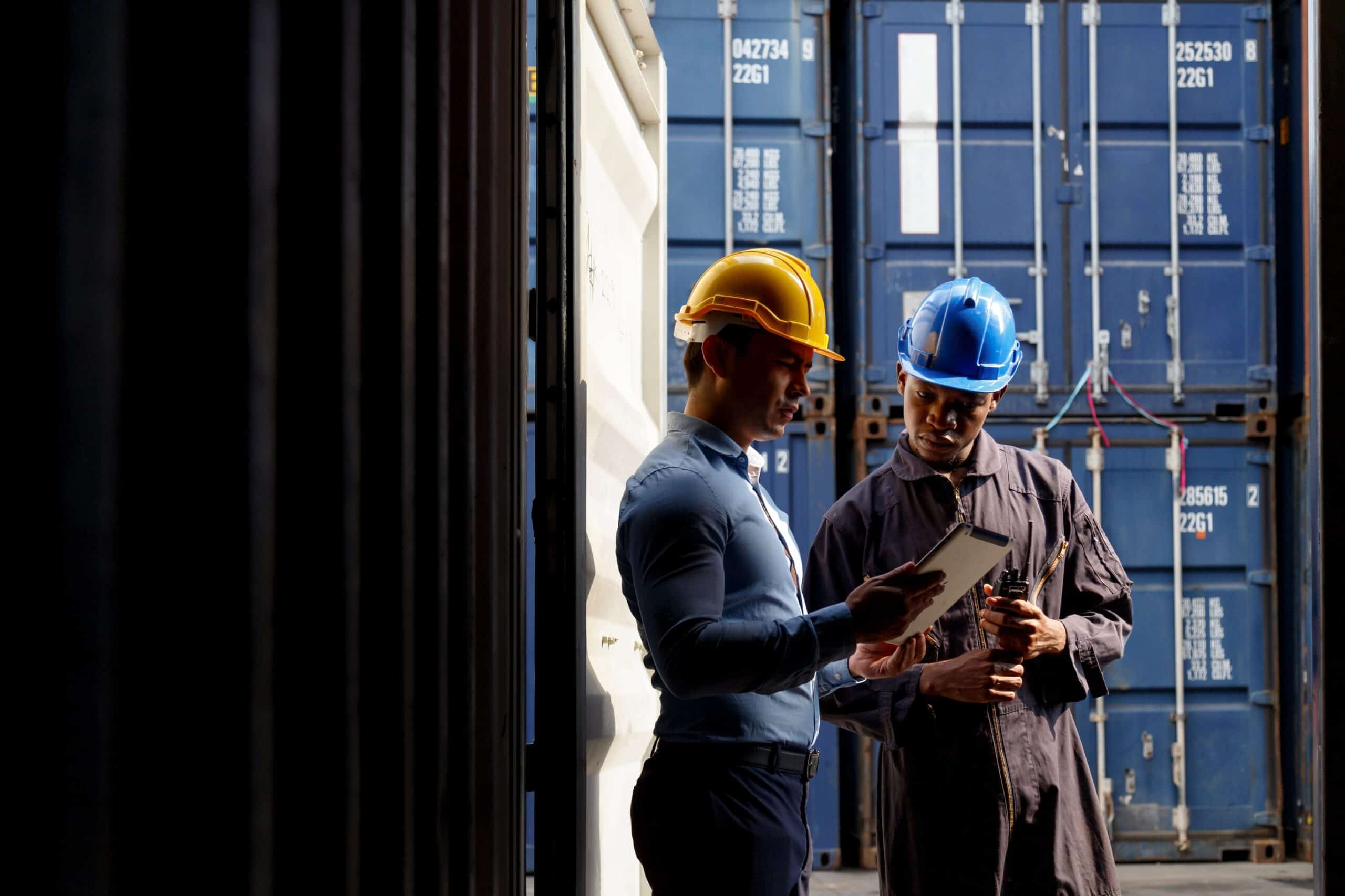 Warehouse,Business,Manager,And,Port,Worker,Working,And,Checking,Container
